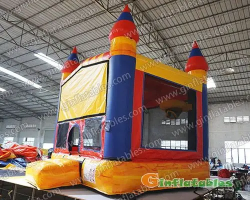 Mini bounce house with basketball hoop