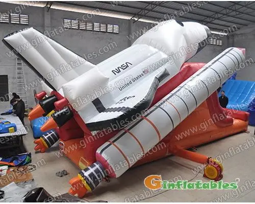 Space shuttle inflatable slide