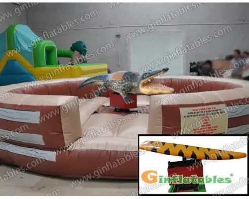 Inflatable crocodile ride with surfboard
